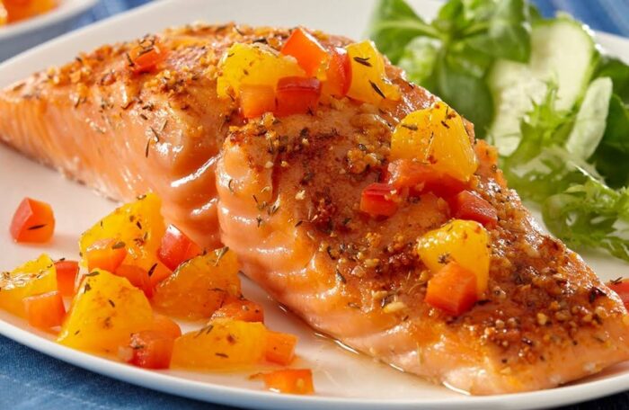 Seared Salmon over Organic Baby Arugula with fresh Mandarin Orange segments 